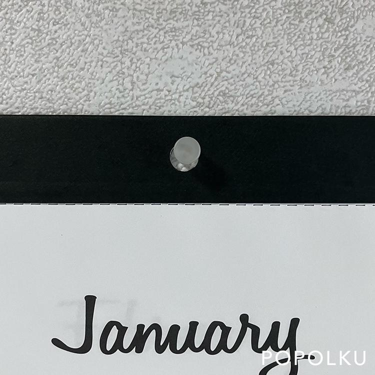 針が細い画鋲で留まる